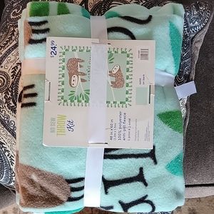 Sloth design no sew blanket/throw kit. new, never opened.  Throw is 48x60.